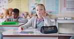 Girl, child and writing in classroom for counting, problem solving or exam for education at academy. Pupil, school kids and math notes in book for learning, scholarship or thinking for test in Berlin