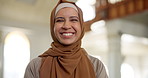 Muslim woman, face and smile in mosque for religion, faith or connection to God in Qatar. Person, hijab and happy with Islam for spiritual development in temple for pilgrimage, devotion or gratitude