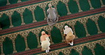 Islam, prayer and group of women in mosque for spiritual worship, praise and religion from above. Culture, respect and Muslim people on carpet with gratitude, morning dua and holy faith in meditation