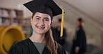 Happy, university and face of woman for graduation, academic ceremony and achievement. College scholarship, education and portrait of student on campus for education, learning and studying in hallway