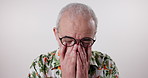 Face, stress and senior man in studio with depression, mental health or anxiety for retirement. Emotion, frustrated and elderly person with tension for finance crisis with pension by white background