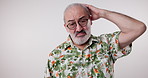 Stress, retirement and senior man in studio with anxiety for travel, vacation or trip with mockup. Crisis, pain and portrait of elderly male pensioner with concern for holiday by white background.