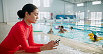 Woman, children and pool for swimming class, development and health with water, inflatable and swimsuit. Aupair, kids and splash in facility for training, summer and sports exercise or wellness