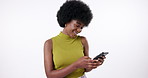 Cellphone, smile and black woman in studio networking online for communication or notification. Gen z, happy and African female influencer scroll on internet for trends with phone by white background