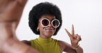 Black woman, selfie and sunglasses in peace sign in studio on isolated white background with fun. Content creator, gen z and fashion in trendy or colorful style, summer clothes and designer brand