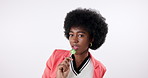 Black woman, afro and sweet with lollipop in fashion for luxury, style or beauty on a white studio background. Portrait of young African, female person or model with cool candy, delight or sugar