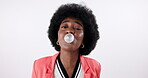 Face, black woman and blowing bubblegum with candy, sweets and smile on white studio background. Portrait, female model and chewing gum for happiness, gen z style and carefree attitude or fun