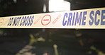 Crime, scene and ribbon with tape for police crossing, investigation or closure with no entry, evidence or case. Empty or abandon house of murder mystery with sign for keep out, barricade or warning