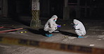 Forensic photographer, crime scene and person at night for investigation, inspection and observation. Hazmat suit, police marker and investigator team with camera for evidence, criminal clue or proof