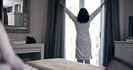 Back, woman and open curtain in hotel or bedroom for wake up, morning routine and fresh air in robe. Person, new day and drapes of window in home for daylight, getting ready and view of accommodation