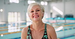 Pool, laughing and portrait of old woman, swimsuit and happy for learning in class of swimming and gym. Training, healthy and fitness for elderly person in retirement, joy and exercise with water