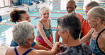 Pool, trainer and senior people, hands and happy for learning in class of swimming and gym. Training, healthy and fitness for old friends in retirement, cardio and clapping for exercise in water