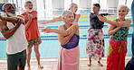 Exercise, stretching and group of senior people for physiotherapy, retirement and aerobics by swimming pool. Elderly men, women and muscle warmup for aquatic training, rehabilitation and hydrotherapy