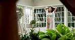 Outdoor, underwear and woman in hotel, walking and sightseeing in destination, trip or relax in vacation. Travel, summer and person in Bali for holiday, peace or smile for nature in morning of resort