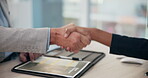 Handshake, interview and resume with business people in human resources office for hiring or recruitment. Application, CV or vacancy with manager and candidate shaking hands in office for opportunity