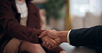 Business handshake, hands and people in hotel lobby for greeting, agreement and welcome to company. Woman, businessman and gesture in foyer for thank you, opportunity and contract negotiation or deal