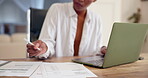 Woman, home and paperwork with laptop for remote work, accounting and finance as accountant. Female person, employee and house in desk with documents for invoices, budget and calculation for bills