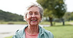 Nature, fitness and face of elderly woman with smile for workout, health and exercise in retirement. Happy, environment and portrait of senior person in park for training, cardio and wellness