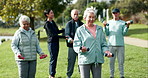 Weights, fitness and senior people in nature with personal trainer for exercise with wellness. Training, dumbbells and group of elderly friends in park for muscle workout with instructor for health.