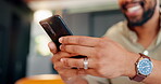 Hands, black man and phone for typing at house for reading news, email and communication notification on social media. Smile, male person and mobile for networking, online chat and entertainment