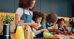 Child development, cooking and food with family in kitchen of home together for diet, health or nutrition. Ingredients, father and mother teaching kids how to prepare meal for dinner or supper