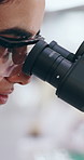 Female person, microscope and laboratory for medical research, science and pharmaceutical testing in medicine. Scientist, equipment and tech for innovation in healthcare, pathology or chemistry study