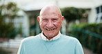 Nature, happy and face of senior man laugh in garden for fresh air, wellness and relax outdoors. Retirement, nursing home and portrait of elderly person with positivity, smile and joy for wellbeing