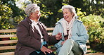 Bench, conversation and funny with old women in park together for bonding or retirement. Laughing, relax and smile with senior friends talking outdoor in garden or nature for community or wellness