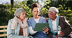 Senior, people and caregiver with tablet outdoor for explaining, help and tech assistance for features. Elderly, women and nurse with mobile for communication on emergency or safety apps support.