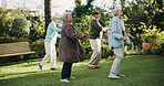 Outdoor, dance and senior people with happiness, friends and retirement with movement, smile and wellness. People, backyard and group with support, healthy routine and recreation al activity in park