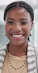 African woman, smile and face in office with confidence, pride and career at startup company. Person, employee and happy with portrait at workplace with trendy style for job at creative agency