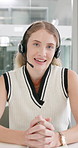 Happy woman, consultant and talking with headphones for video call, customer service or telemarketing at office. Portrait or pov of young female person or agent talking with mic for online assistance