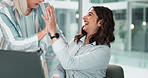 Woman, employees and high five on laptop at office for financial reports, reviews and feedback. People, accountants  and happy with teamwork or collaboration with success or achievement on target