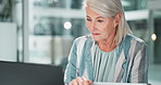 Laptop, tablet or mature businesswoman in finance for financial solution, profit or career opportunity. Economy, tax or accountant in office for policy update, company payroll or bookkeeping online