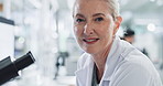 Face, microscope and science with woman in lab for development, discovery or innovation. Healthcare, medical and portrait of mature scientist working on pharmaceutical breakthrough or research 