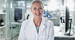 Mature woman, scientist and happy in lab for medical or science research and investigation. Female person, portrait and smile or proud for career growth as expert for drug trial and experiment