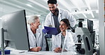 Clipboard, computer and success with science people in lab for breakthrough, report or research. Desk, innovation and laughing with doctors working together for pharmaceutical discovery or solution