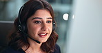 Call center, computer and smile with business woman in office at night for tech support or solution. Contact, customer service or help and happy telemarketing employee with headset in crm workplace