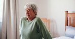 Senior woman, exercise and stretch with bed, care and support for recovery for physical therapy. Elderly patient, bedroom and mobility for walking, balance or rehabilitation from injury in home