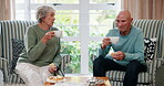 Coffee, conversation and retirement with old couple eating food or lunch in living room of home. Love, comfort or medical with senior man and woman talking in apartment for break or healthcare