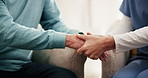 Holding hands, home and senior man with nurse, retirement and healthcare with compassion, grief and loss. Closeup, elderly person and caregiver with patient, support and cancer diagnosis with empathy