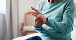 Senior man, hand pain and massage for arthritis problem, inflammation and fibromyalgia risk in home. Elderly male person, accident and rub palm for osteoporosis, muscle injury and anatomy bruise