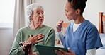 Caregiver, senior woman and tablet for conversation at house for medical, consultation and results information. Elderly, patient and nurse for communication of diagnosis report, advice and wellness