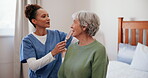 Caregiver, senior woman and hair brush in bedroom at nursing home with smile and haircare. People, nurse and happy with  pensioner in conversation at retirement house for support, care and grooming