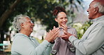 Senior couple, personal trainer and applause in park with fitness achievement and exercise success. Celebration, elderly people and happy carer with smile, support and care outdoor for wellness