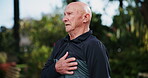 Senior, man and outdoor with pain by heart with discomfort, medical distress and running for exercise or health. Elderly person, cardiovascular risk and tired of workout, stroke and hypertension