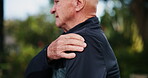 Senior man, hand and exercise with shoulder pain in park for muscle spasm, inflammation and ache. Outdoor, fitness and person with workout injury in nature for arthritis, strain and tension problem