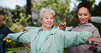 Elderly woman, coach and stretching arms for exercise outdoor of healing, rehabilitation training and mobility. Senior, person and instructor for fitness class, shoulder workout and wellness support