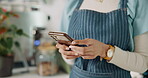 Hands, waitress and mobile phone for small business, communication or online order in cafe. Barista, tech and industry for connection, takeaway or delivery in customer service, social media or review