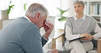 Senior, man and sad in consultation for therapy, counseling and emotional support for coping with grief or loss. Elderly man, psychologist and conversation for bereavement, healing and mental health.